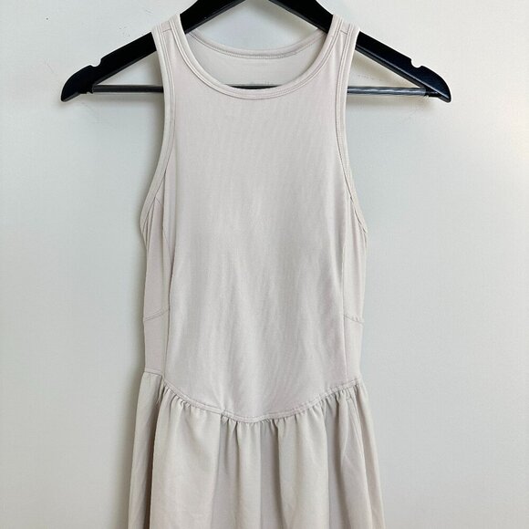 Elegant White Sleeveless Dress - Picture 5 of 16